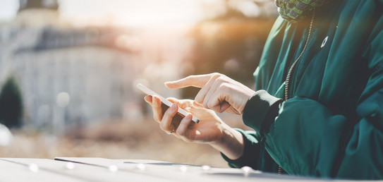 Smartphone A person types in something on a smartphone
